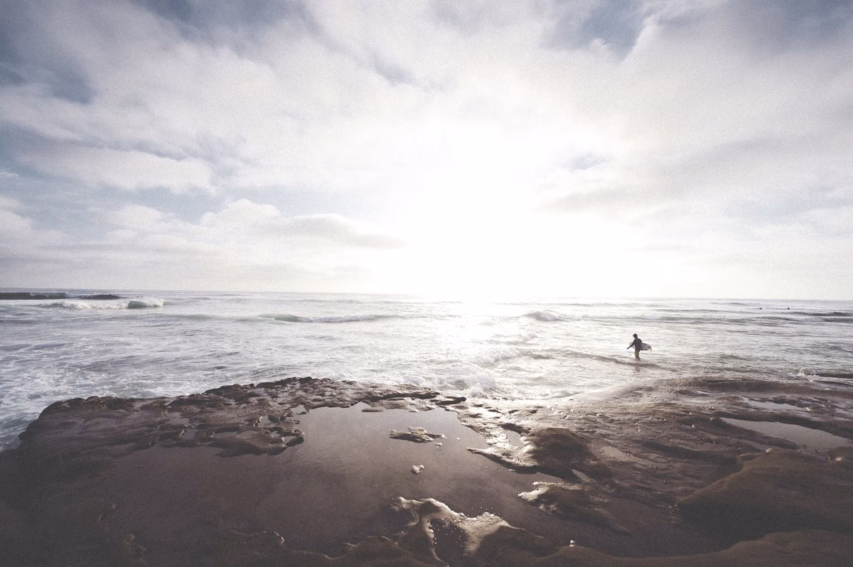 Wet sand and the water's edge on a north San Diego County beach
